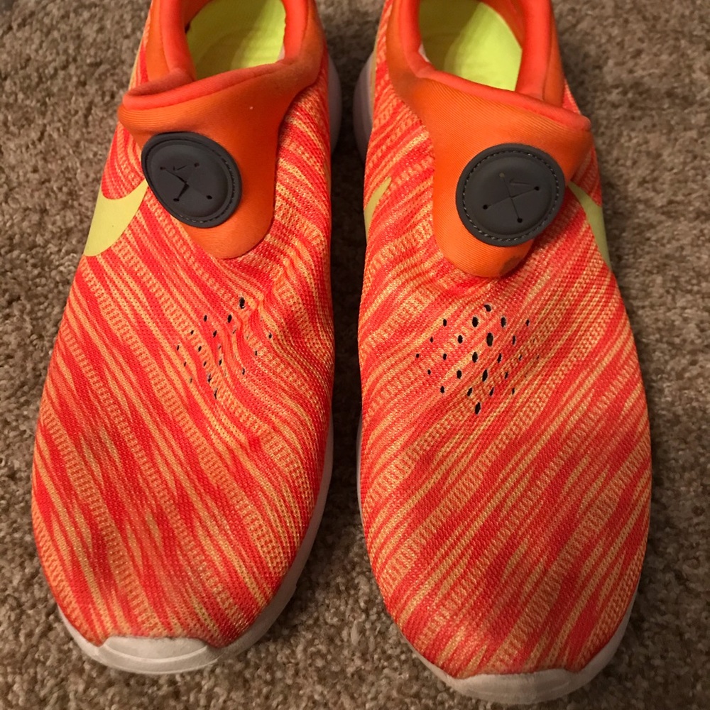 Orange Nike shoes